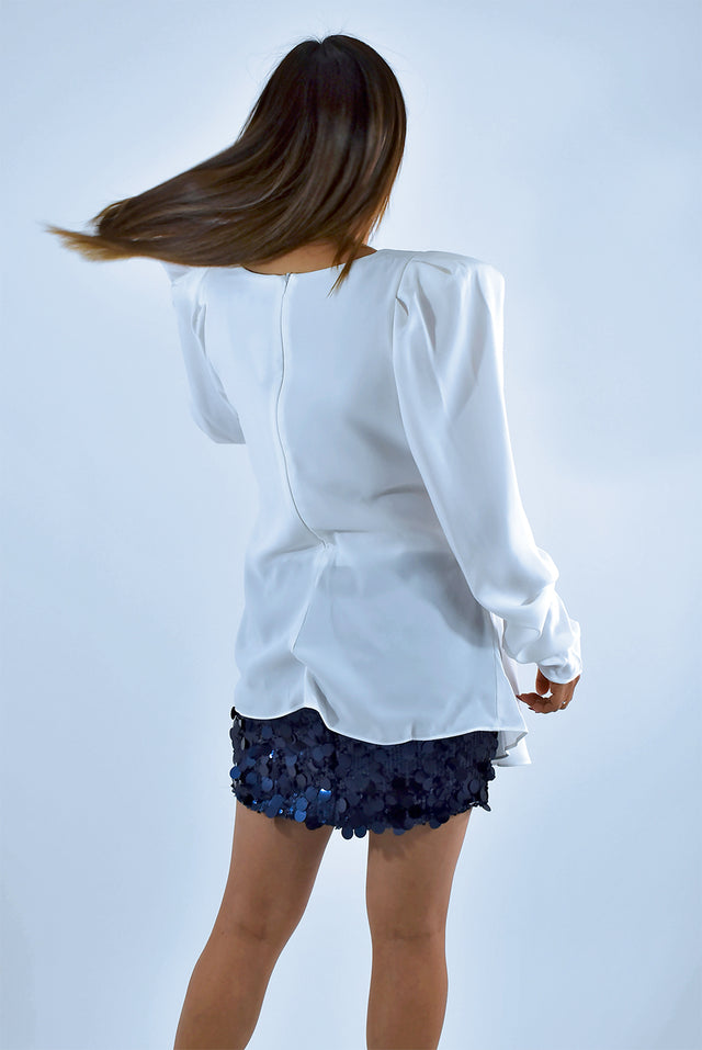 BLUSA CON DRAPEADO